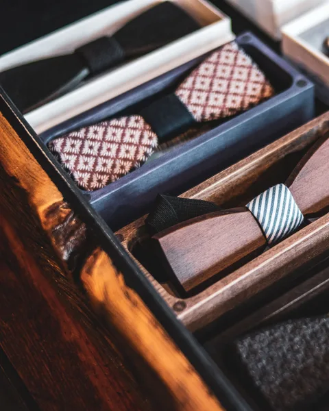 Men's Signature Wardrobe Transformation — silk bow ties and pocket squares in an accessory box